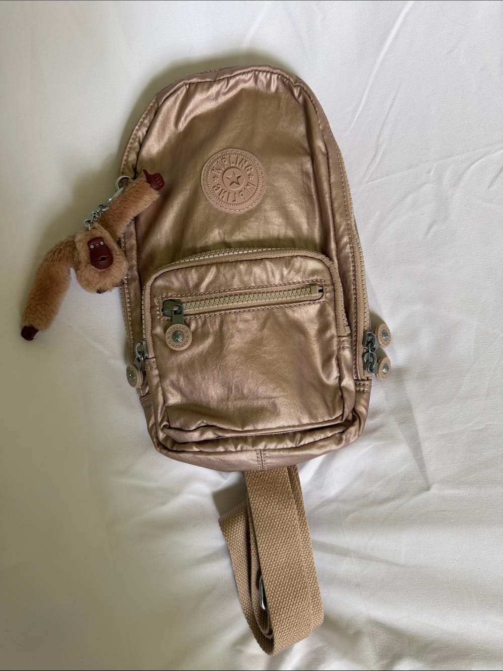 Kipling Metallic Rose Gold Crossbody Sling Backpack